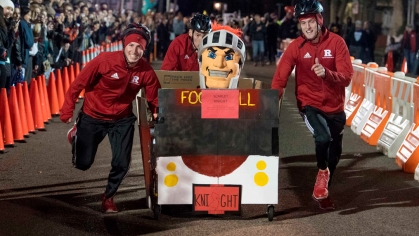 Students pushing RU bed