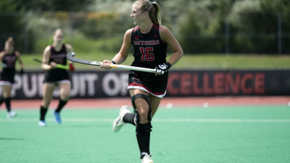 Field Hockey player running